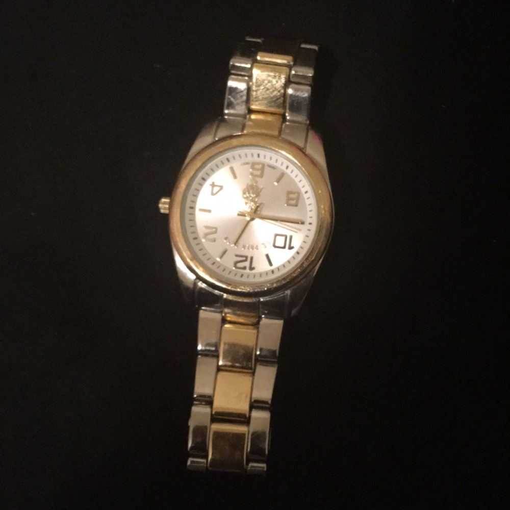 Gold polo watch